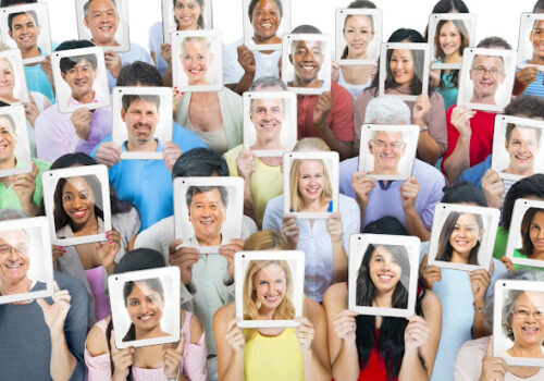 Multi-ethnic casual people holding the tablet